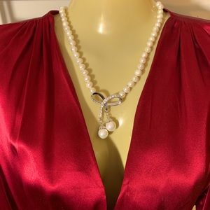 Genuine Pearl Necklace with Bow Pendant